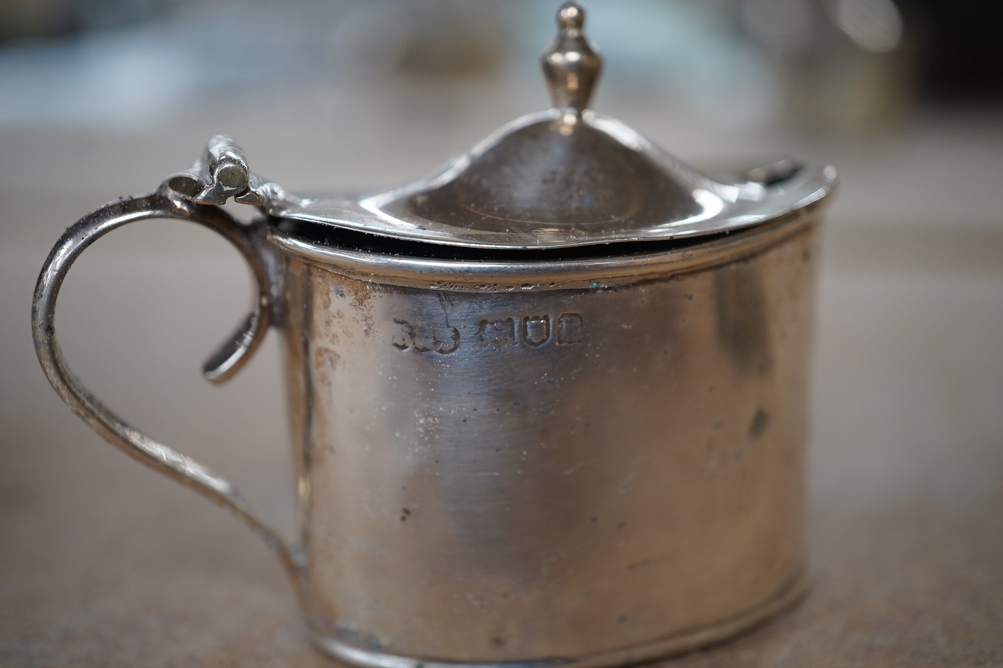 Sundry small silver including a pair of Edwardian pierced bonbon dishes, Chester, 1906, diameter 11cm, pair of Scottish bun salts, five other condiments, three napkin rings, two spoons, a bowl, toast rack, whistle match